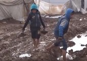 Deep Mud Swamps Camp In Zayzun, Syria, for Displaced Persons