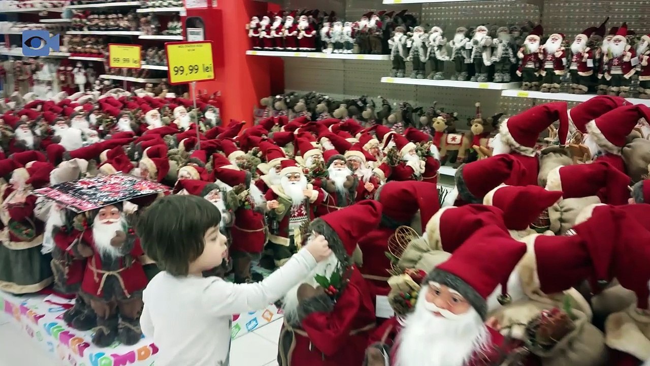 Baby discovering Christmas decorations in Jumbo