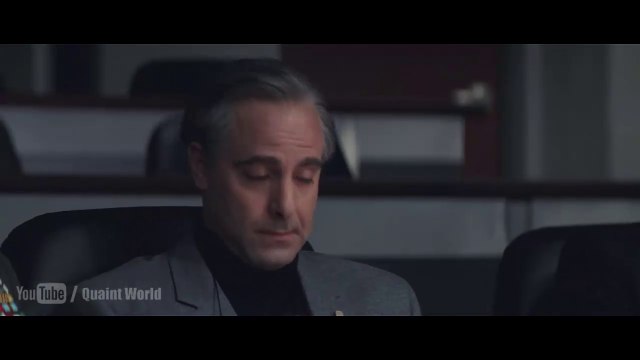 Aaron Eckhart and Stanley Tucci explaining about the earth's core and the future risk