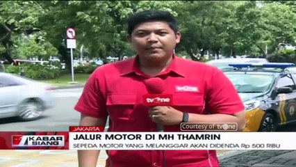 Polisi Sosialisai Jalur Khusus Sepeda Motor di MH Thamrin