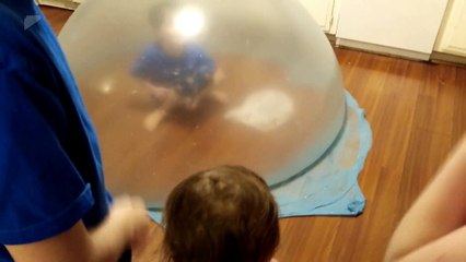 Kid Sits Inside Giant Slime Bubble