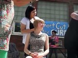 Blonde girl headshave for charity