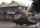 Motorists Drive Through Floodwaters in Broome