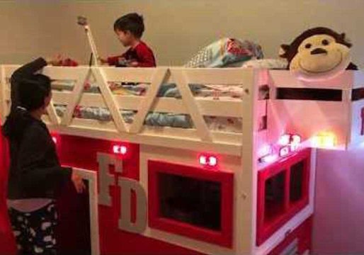 Little Boy Is Delighted by His New Fire Truck Bed