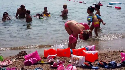 Children playing happily on the beach - İçmeler / Turkey