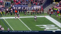 2014 - New England Patriots quarterback Tom Brady connects with tight end Rob Gronkowski for a TD