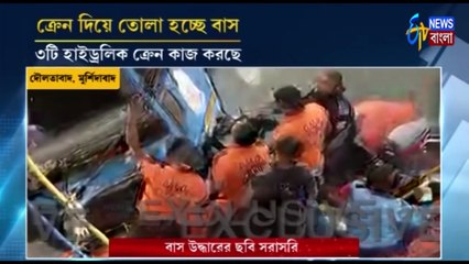 নদী থেকে ক্রেন দিয়ে  বাস উদ্ধারের চেষ্টা