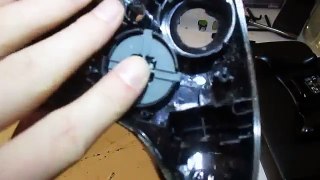 How to take apart a xbox 360 controller with a flat head screw driver
