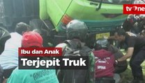 Penyelamatan Dramatis Ibu dan Anak yang Terjepit Truk