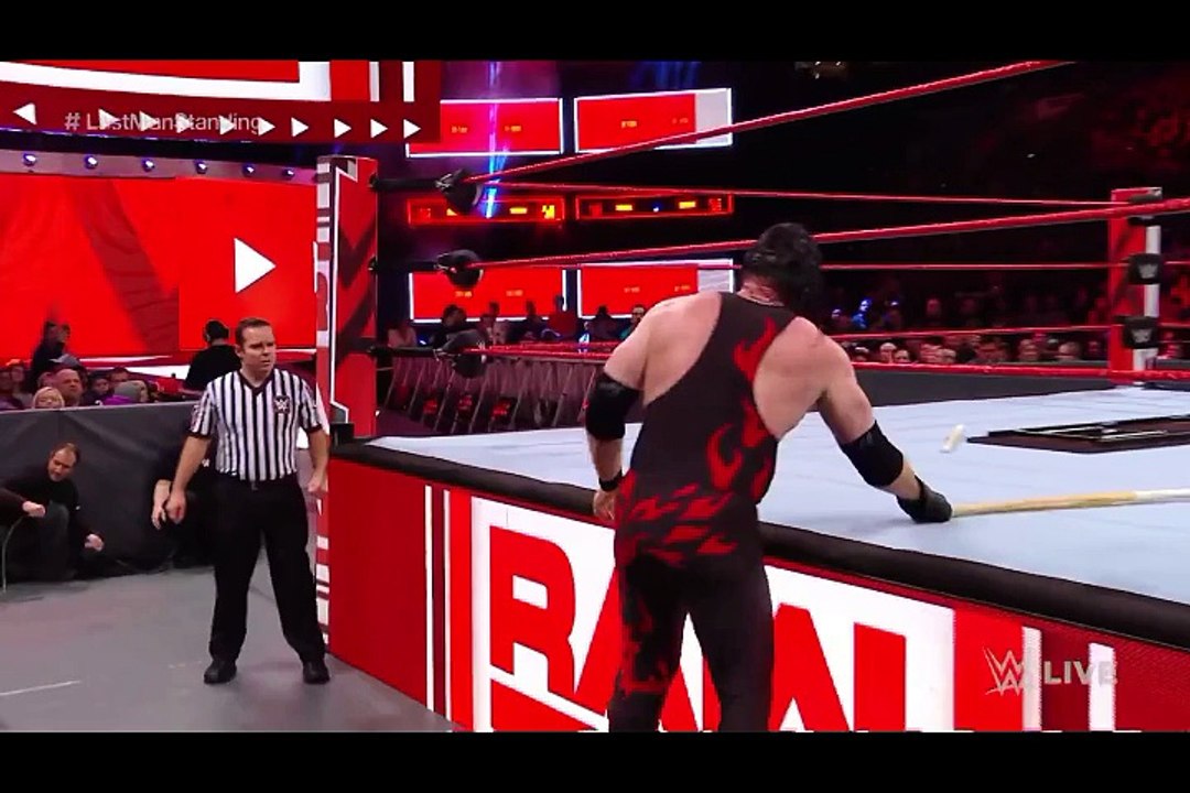 Braun Strowman crushes kane underneath the announce team stage.