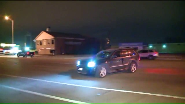 Suspect Tries to Run Over Cop with Stolen Squad Car, Prompting Officer to Shoot