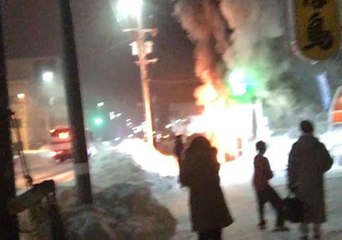 Bystanders Watch Fire at Sapporo Welfare Facility