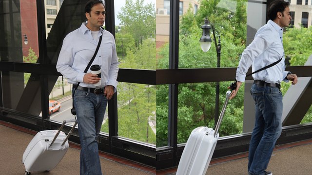 Roll your suitcase hands-free with this add-on strap