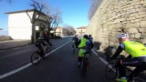 Priest Rides Bicycle with Other Cyclists