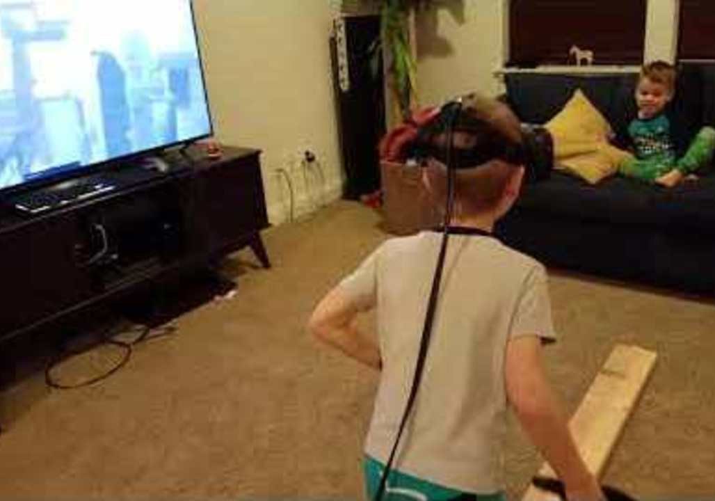 Dad Pushes Kid During VR Game