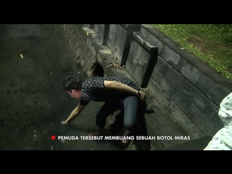 Buang Miras ke Selokan, Pria ini Diminta Petugas Ambil Kembali - 86