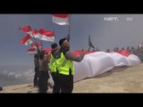 Polres Banyuwangi Kibarkan Bendera Merah Putih di Gunung Ijen Dalam Rangka HUT Kemerdekaan RI ke-72