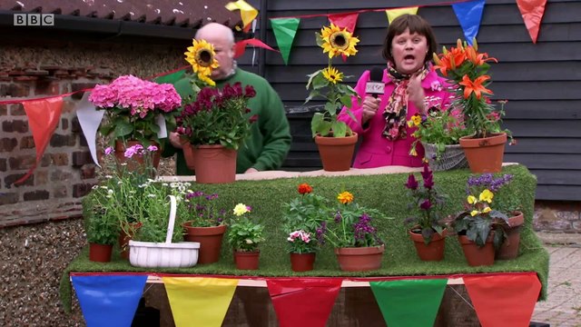 Gigglebiz Gail Force has some flower related problems at the village fete