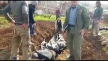 Afrin'de Pyd'lilerin Cesetleri Gömülüyor- Türk Silahlı Kuvvetleri'nin Zeytin Dalı Operasyonunda Etkisiz Hale Getirilen 900’e Yakın Pyd Terör Örgütü Üyesinin Cesetleri, Özgür Suriye Ordusu Tarafından Açılan Büyük Mezarlara Gömülüyor