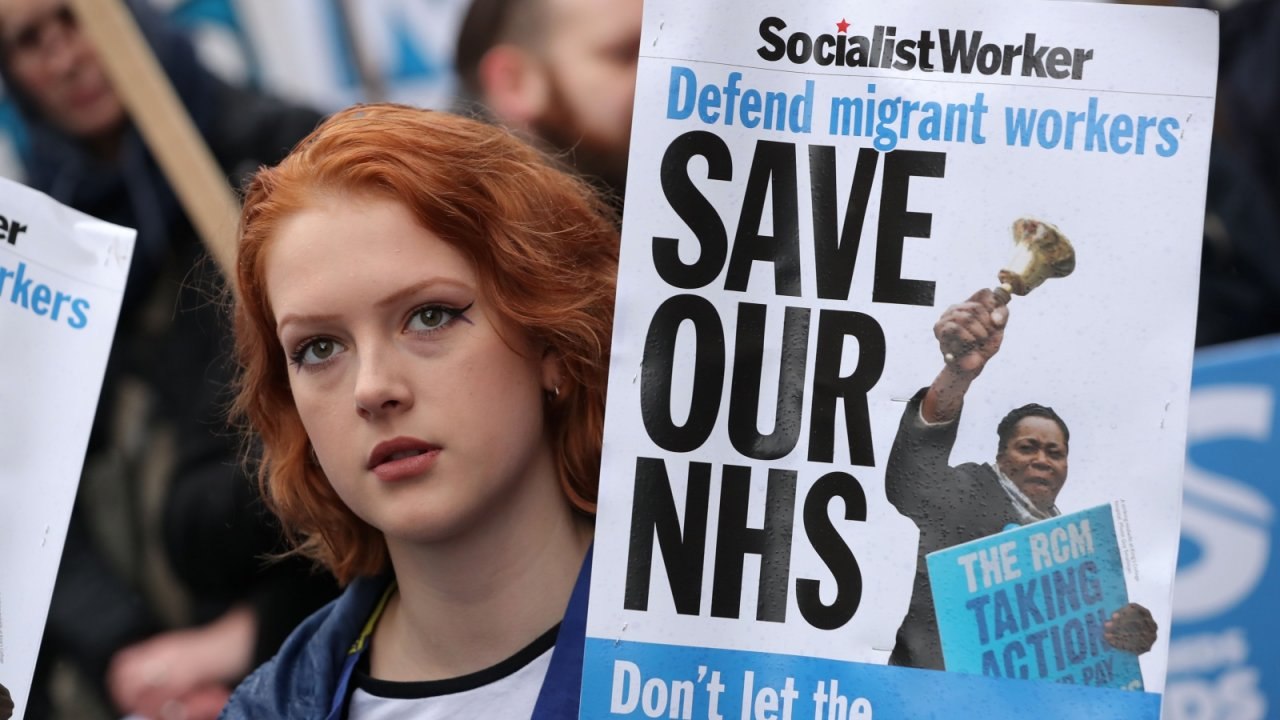 "No ifs, no buts, no NHS cuts" - Thousands march on Downing Street over NHS crisis