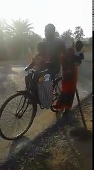 ஒரு காலில் மனைவி குழந்தையை வைத்து சைக்கிள் ஓட்டும் மாற்றுத்திறனாளி- வீடியோ