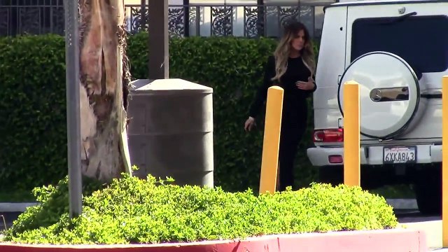 Khloe Kardashian Flaunts Curves in Black Peekaboo Dress [2014]