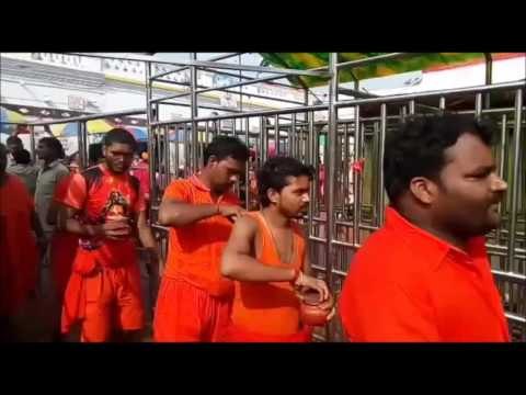 devotee doing jalabhishek in basukinath temple