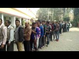 People standing in line for money infront of ATM at Meerut