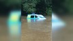 British backpackers wake up to find van partially submerged by floodwaters