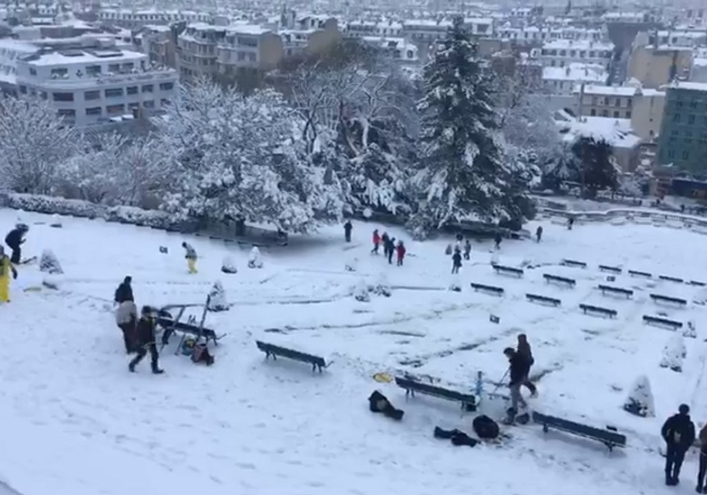 Parisians Take the Piste in Montmartre as Snow...