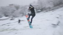 Parisians create makeshift ski slopes amid snowstorm