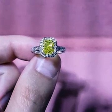 Yellow diamond halo engagement ring