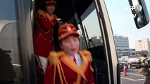 North Korean cheerleaders arrive at Olympic Village