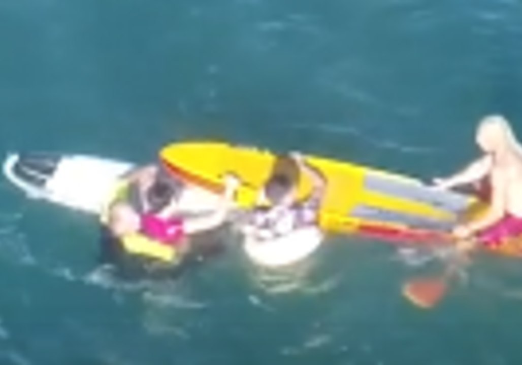 Swimmers Saved From Rip by Off-Duty Lifeguards and Surfer