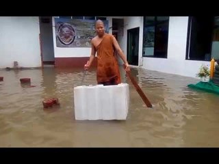 Buddhist monk in the use of the boat made ​​of thermocol