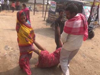 Women patient pulled on surface after stretcher not made available