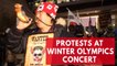 Protesters demonstrate outside North Korean orchestra performance at Winter Olympic Games in Pyeongchang