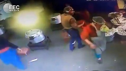 Workers are burned when a pressure cooker explodes