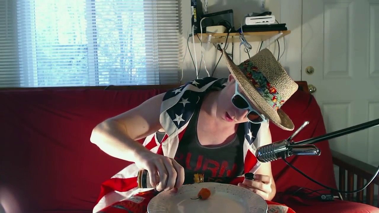 Guy Eats Habanero Covered in Ghost Pepper Hot Sauce