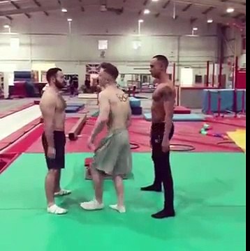 Gymnasts Perform Wild Backflips To Put On Their Shorts
