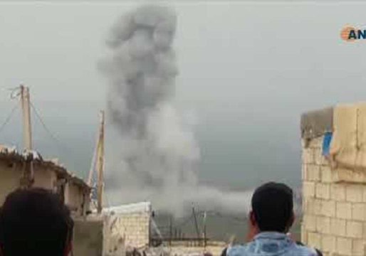 Plume of Smoke Towers Over Syrian Border Town During Strikes and Clashes