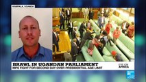 Ugandan MPs fight in parliament for second day over presidential age limit