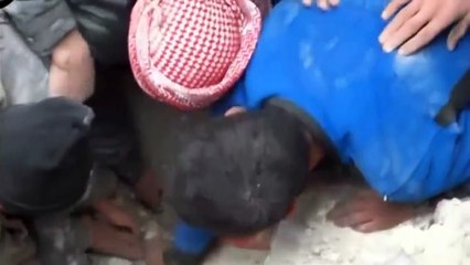 Amazing rescue: Buried baby is pulled from underneath rubble in Aleppo, Syria