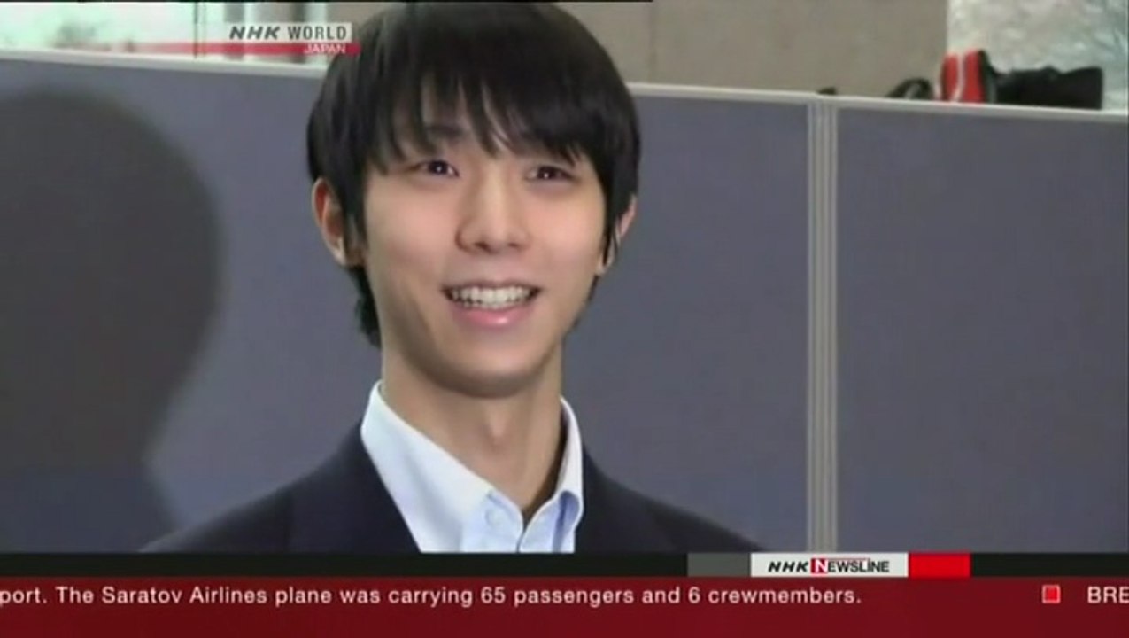 NHK Newsline 2018.02.11 - Yuzuru Hanyu arrives...
