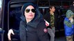 Angelina Jolie bundles up in a padded coat and beanie hat as she heads out in chilly New York City with her kids after scoring TWO Golden Globe nods