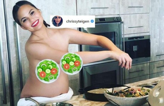 Chrissy Teigen shares topless photo