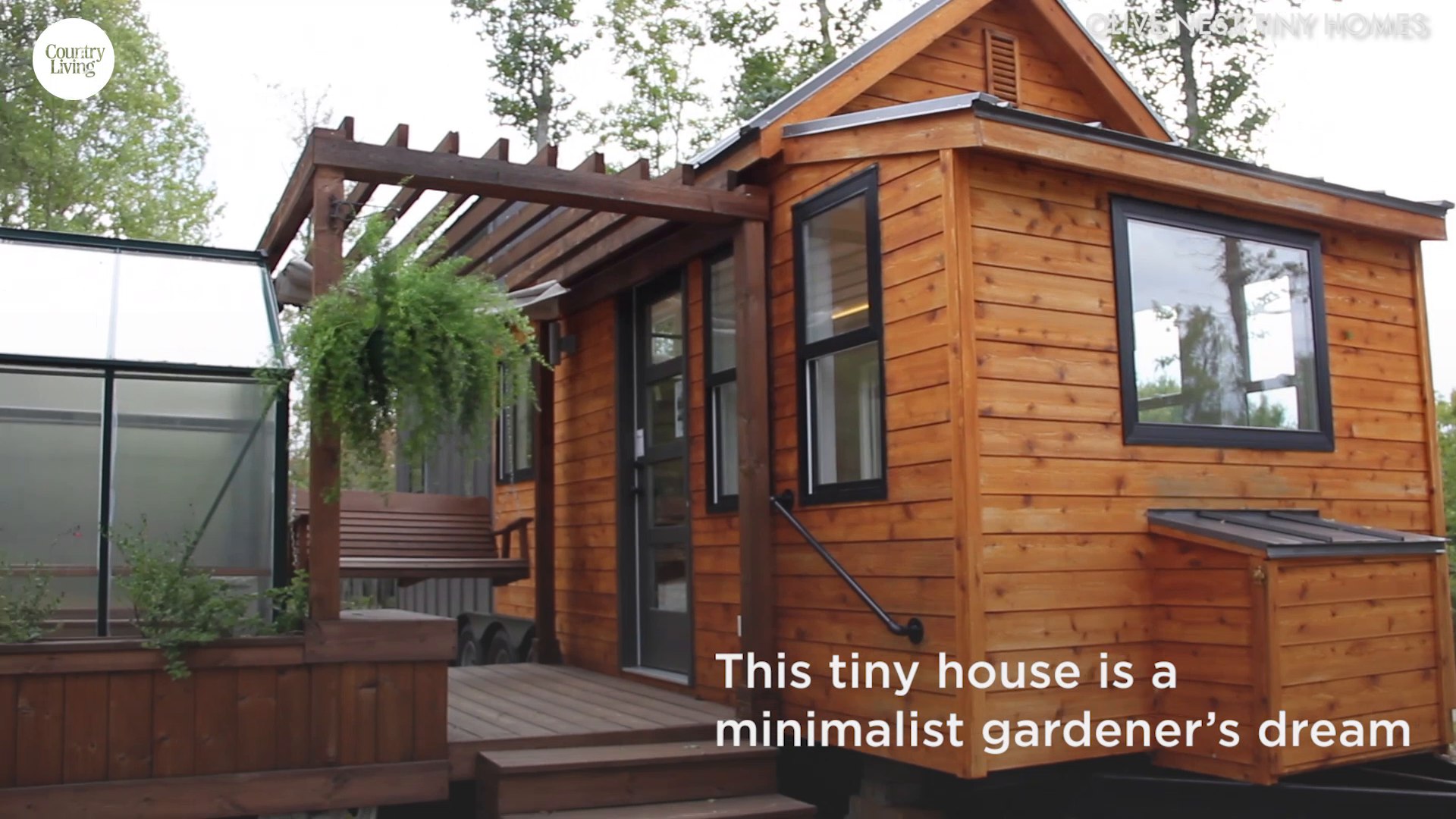 The Elsa Tiny House Has Greenhouse And Porch Swing Unique Tiny Home
