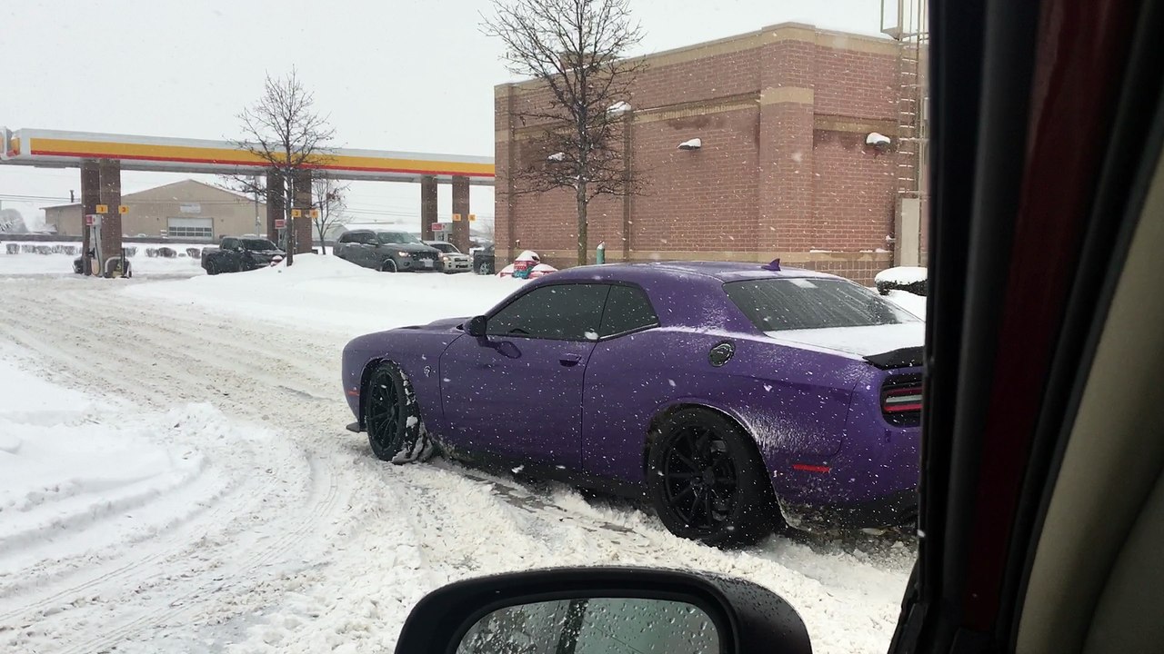 Challenger Sliding Into Gas Station