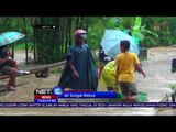 Hujan Deras Akibatkan Air Sungai Meluap ke Jalan Raya - NET12