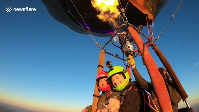 Couple celebrates Valentine's Day be leaping from hot air balloon
